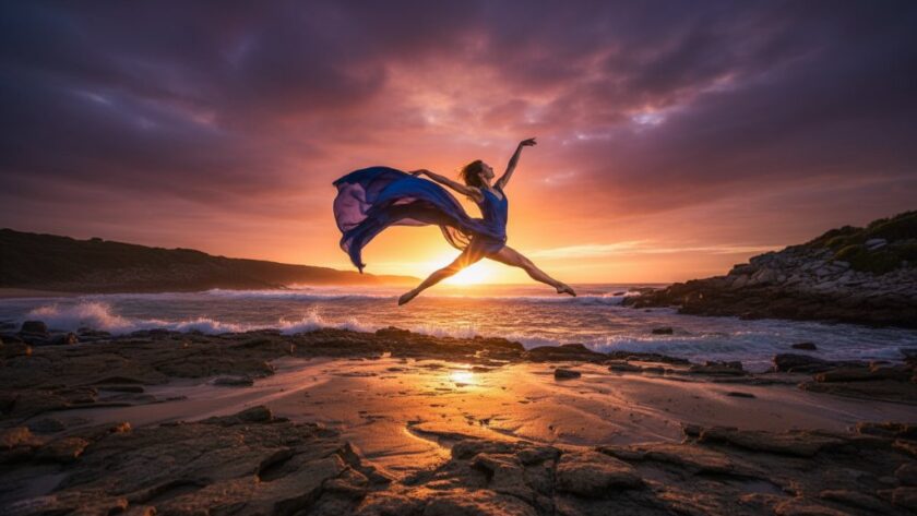An epic moment in Wonthaggi Dance Photography Capturing Coastal Movement, featuring a dancer in dynamic mid-air leap on a rugged beach at sunset, dramatic lighting, capturing raw emotion and powerful artistry.